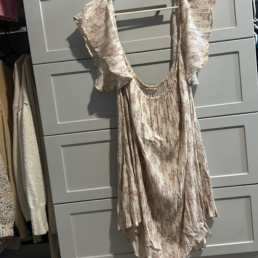 Billabong boho printed dress size M with ruffled cap sleeves . Never worn